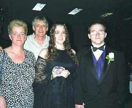 Left to right: Kim's Mom, Kim's Dad, Kim, Me